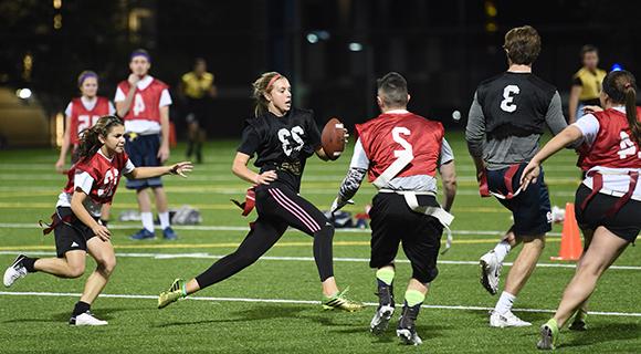 Image of people playing flag football